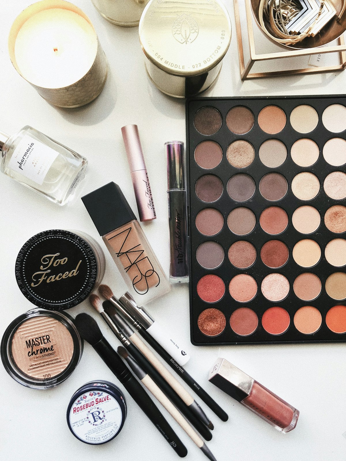 Everyday makeup products including lipsticks arranged on a table
